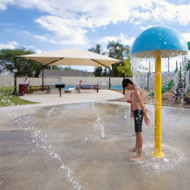Splash pad water park picnic area and pickleball courts at Grand Junction Canyon View RV Resort